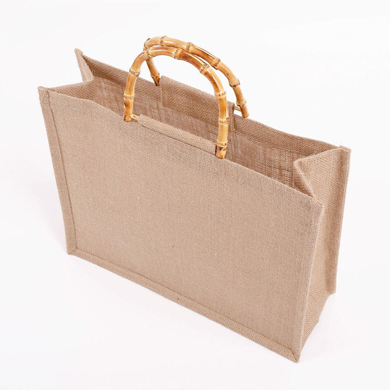 Bolso de mano de yute reutilizable respetuoso con el medio ambiente a la moda, bolso de arpillera de embalaje de regalo de lujo, bolso de compras impermeable